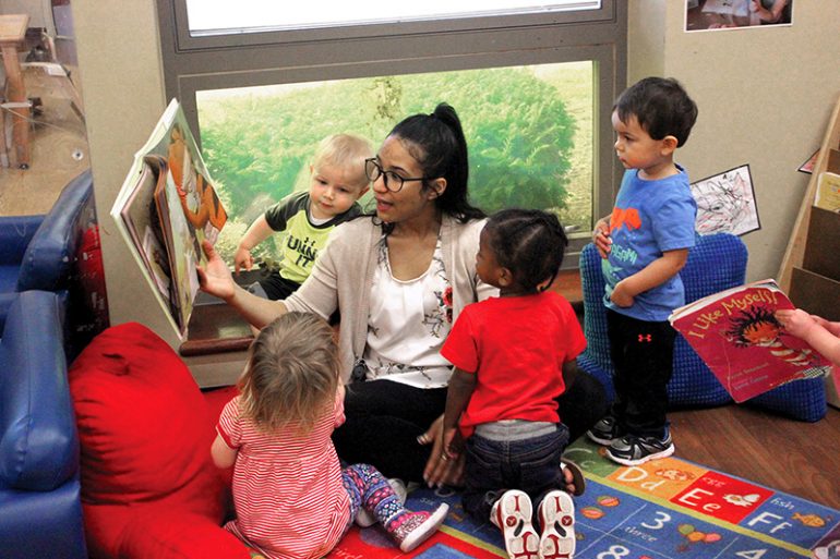 preschool-teacher-reading-to-kids - Early Learning Nation